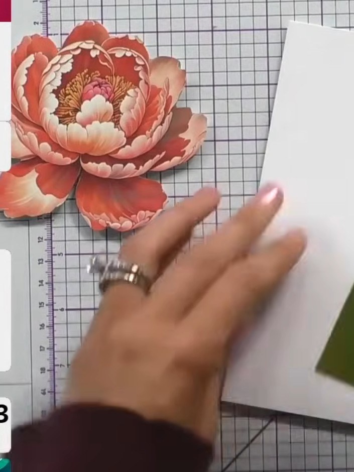 Step 4: Gently manipulate the layered flower by pinching the petals and lifting the corners to add natural shaping and
