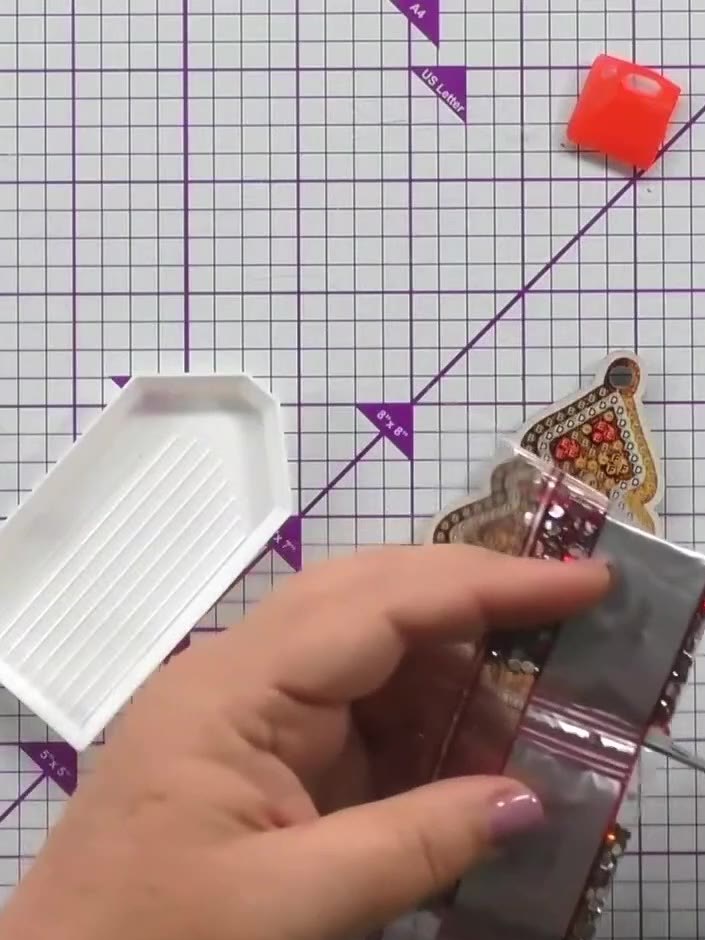 Step 5: Use scissors to carefully cut the perforated crystals from the sheet rather than pulling them apart. This prev