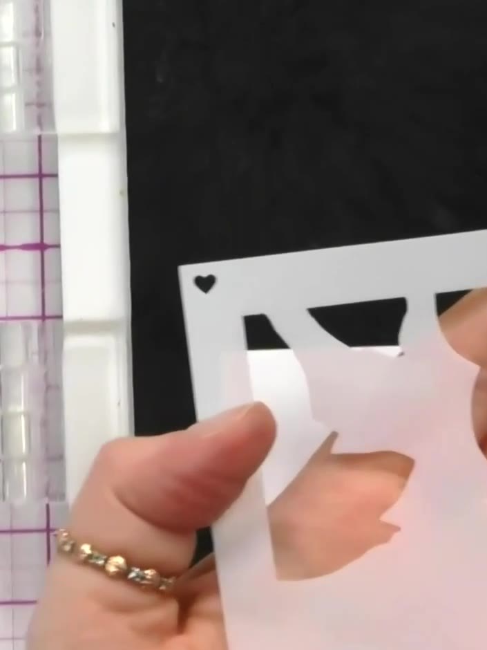 Step 2: Locate the number on the first stencil to ensure it is positioned the right way up before use.