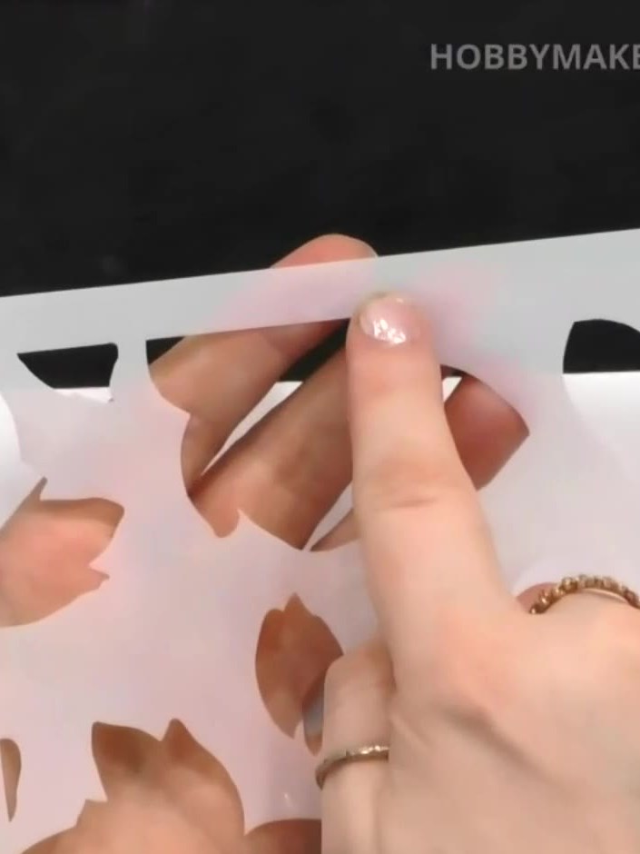 Step 3: Apply your lightest colour ink through the largest stencil using a dauber. Work gently across the design, buil