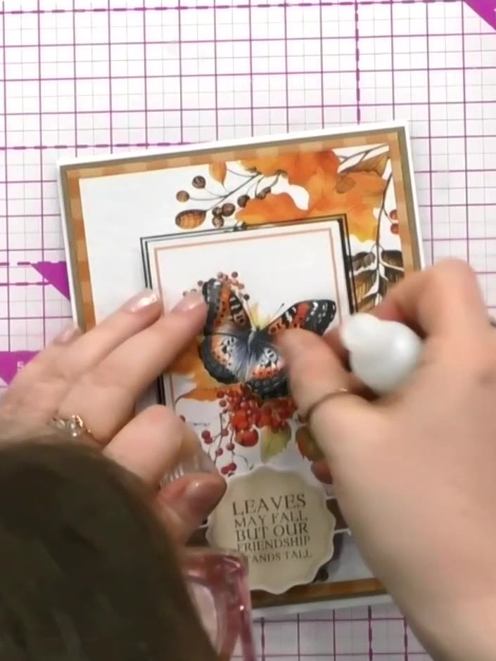 Step 12: Optionally add glitter along the sentiment banner for extra sparkle. Use a glue pen or adhesive to apply glitt