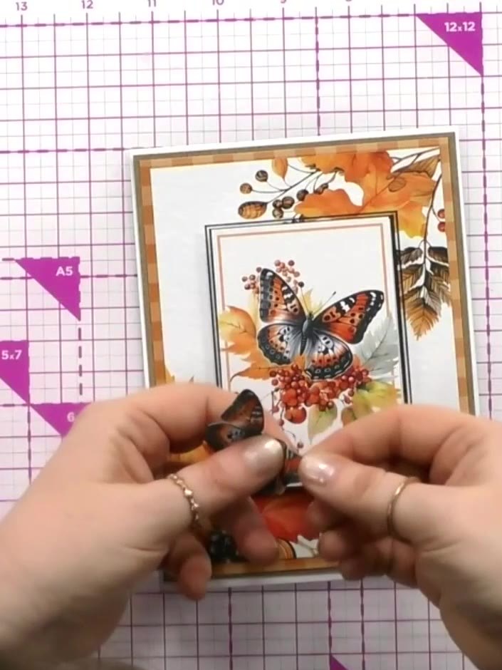 Step 9: For added dimension, carefully snip out individual elements such as butterflies from the design. Gently curl t