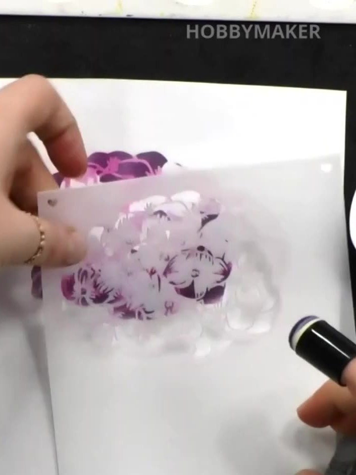 Step 8: Mount the finished floral design onto a white card blank using adhesive to complete your card.
