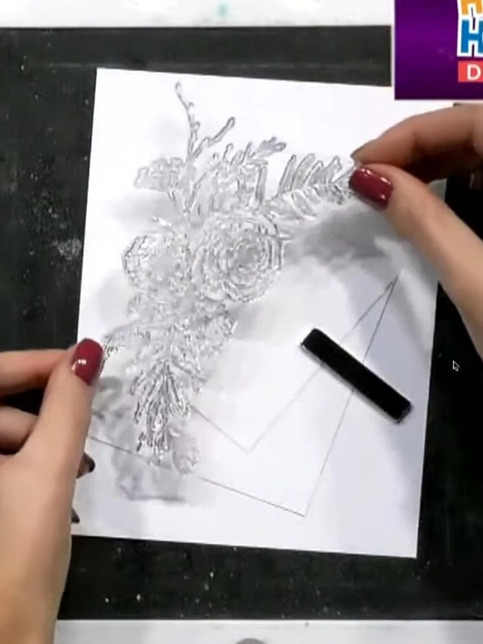 Step 2: Stamp the thistle design onto all three layers of card using black ink. Position the stamped image along the c
