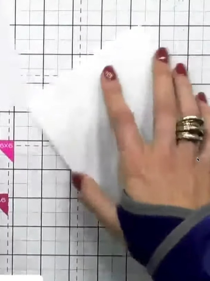 Step 3: Remove the first stencil and position stencil number two over the card panel. Align it carefully using the hea