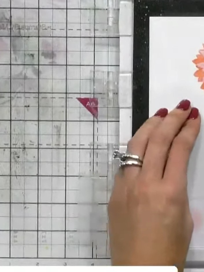 Step 8: Open the 3D embossing folder and place your die-cut stencilled piece inside the folder, positioning it central