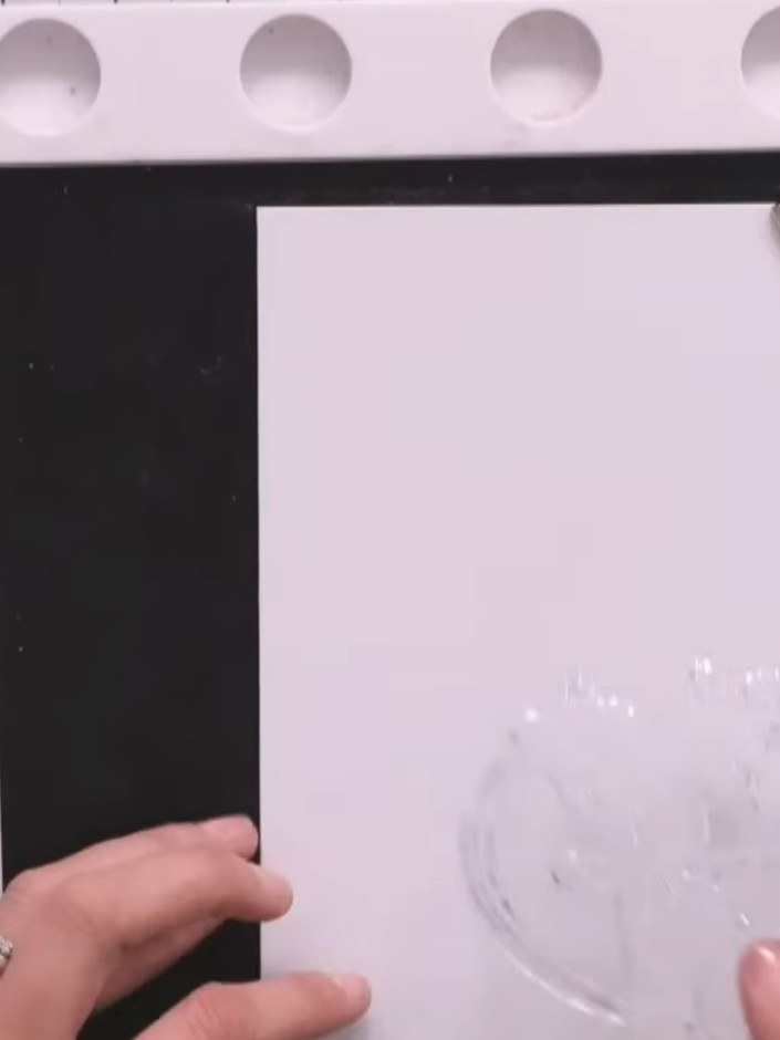 Step 1: Wipe your rubber stamp with an anti-static bag to remove any dust or moisture before inking. This prevents whi