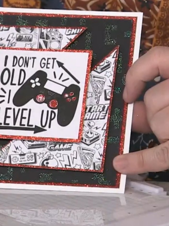 Step 7: Cut a rectangle mat from glitter cardstock slightly larger than your square stamped element. Cut diagonally fr