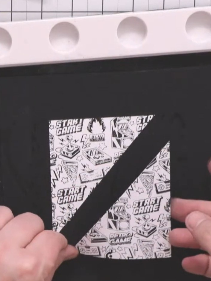 Step 9: Mount the stamped white square onto the black glitter rectangle mat using wet glue around the edges for securi