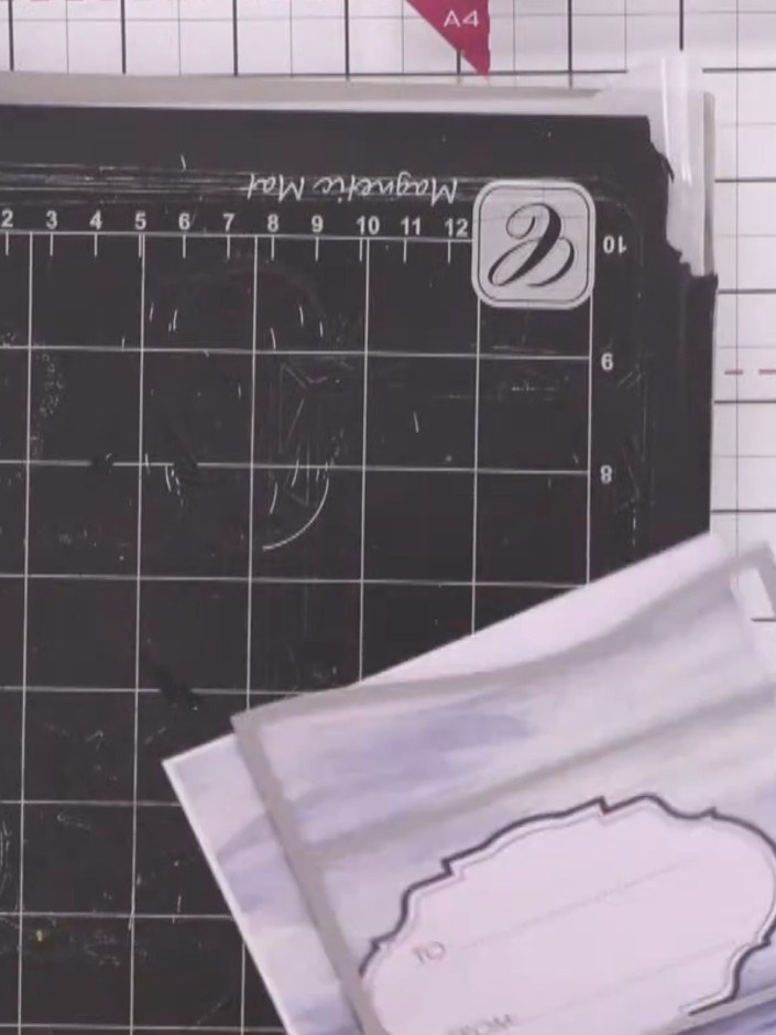 Step 4: Place your chosen die and paper onto the magnetic mat. Run the die and paper through your cutting machine to c