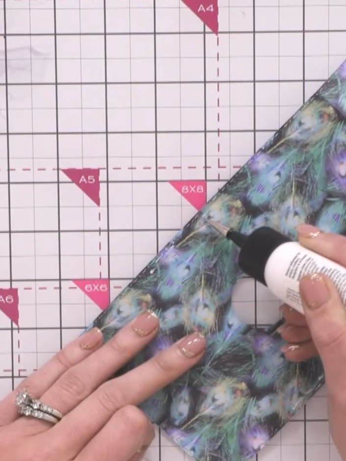 Step 6: Apply glue down the sides of the folded piece to secure the structure. Use a strong adhesive to ensure the wal