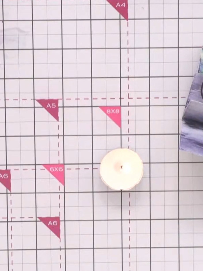 Step 1: Light your wax seal candle and allow the wax to melt completely. Place the candle on your craft mat in a safe 