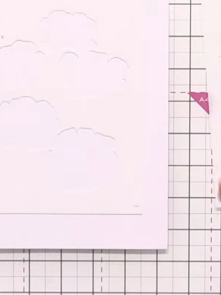 Step 2: Ink the first stencil layer using light pink ink, pressing the ink pad gently and evenly across the stencil to