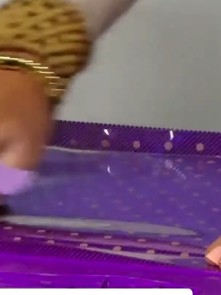 Step 1: Cut two pieces of purple acetate paper to 12 inches by 10 inches using a scoring board and trimmer.