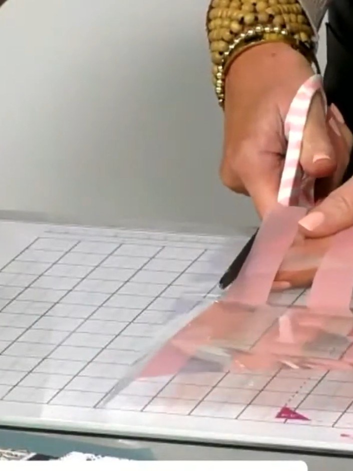Step 7: Cut away the two end panels from the acetate template. Remove a small corner section from the centre panel to 