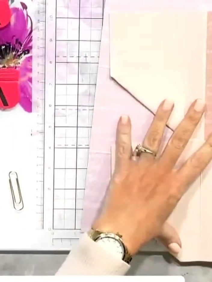 Step 2: Score the paper again at 8 inches to divide it into three equal sections of approximately 2.67 inches each.