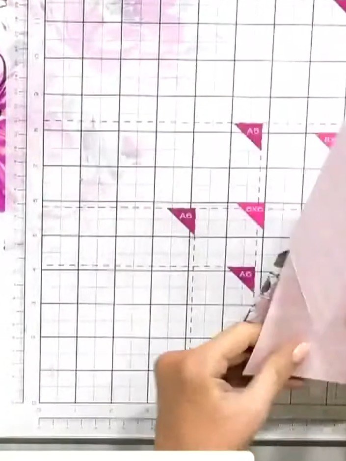 Step 7: Fold the cut sections back and forth along the score lines to create accordion-style folds for the explosion e