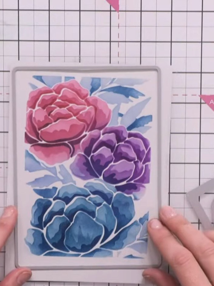 Step 7: Trim the inked card roughly with scissors to remove excess white card around the floral design.
