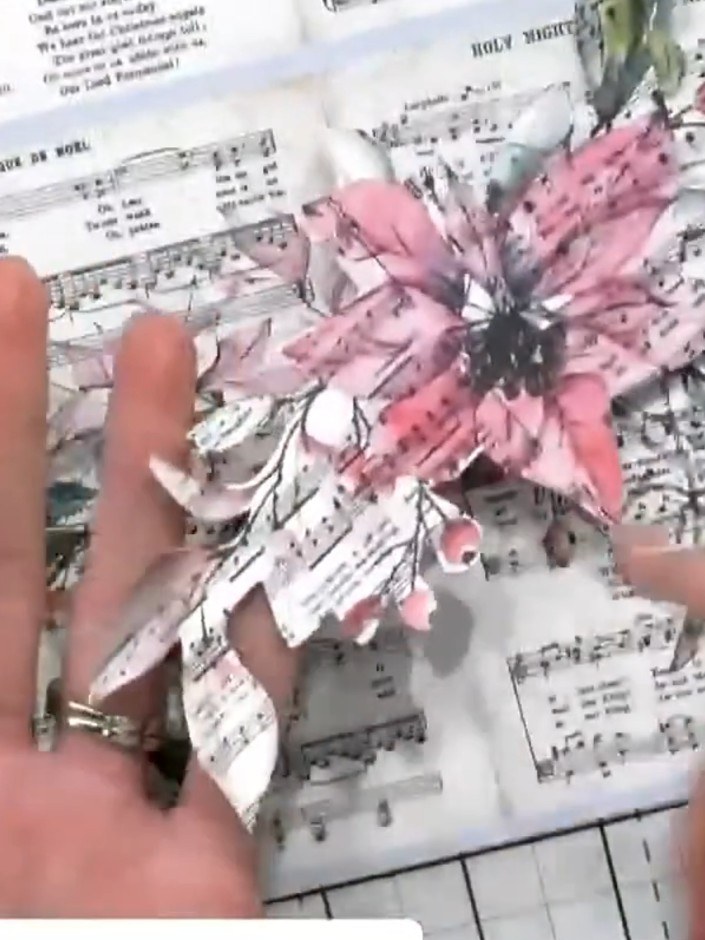 Step 2: Adhere the die-cut floral element onto the front of a top-folding note card base, positioning it centrally ove