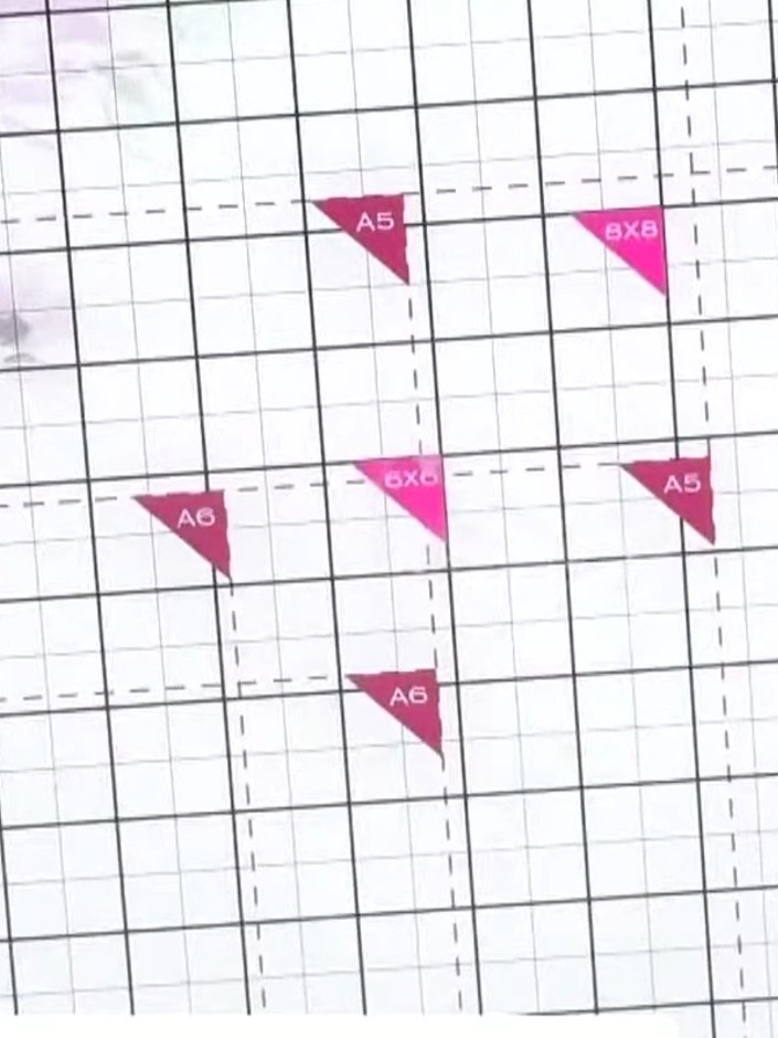 Step 1: Cut a piece of patterned paper to your desired card size using a cutting mat and ruler. The paper shown has pi