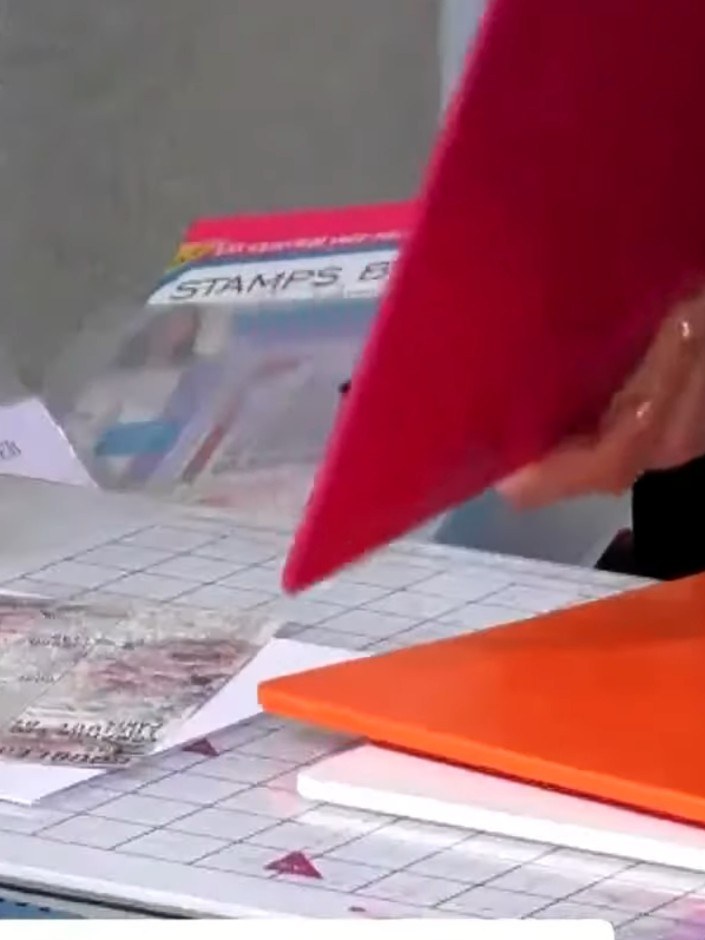 Step 2: Place the patterned paper into the 3D embossing folder, positioning it in the centre of the folder as accurate