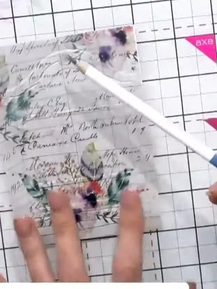 Step 3: Close the embossing folder with your card inside and run it through your die-cutting machine according to the 