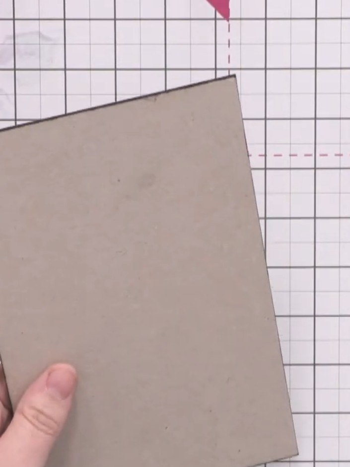 Step 1: Prepare a chunky board base by layering card together to achieve the desired thickness. Edge the board with bl