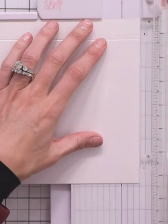 Step 2: Using a guillotine, trim approximately 1mm off the top and one side of one piece to create a slightly smaller 