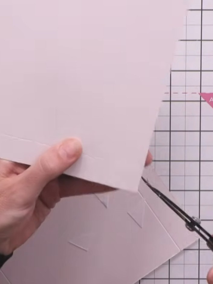 Step 5: Fold up all four sides of the box base along the score lines to create the box walls.