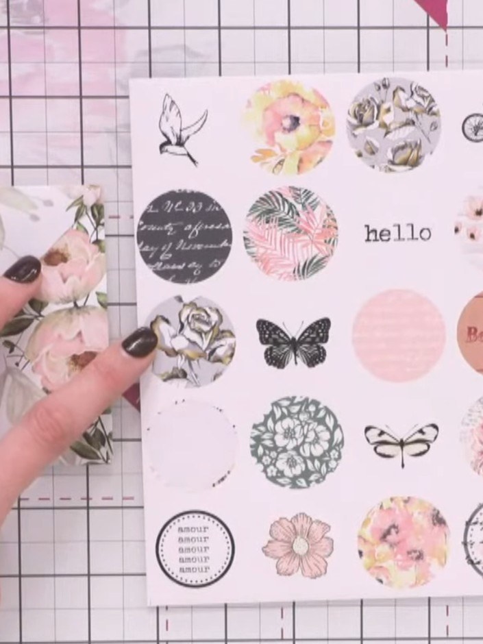 Step 4: Select a coordinating sticker from the collection that matches your envelope design. Choose from the variety o