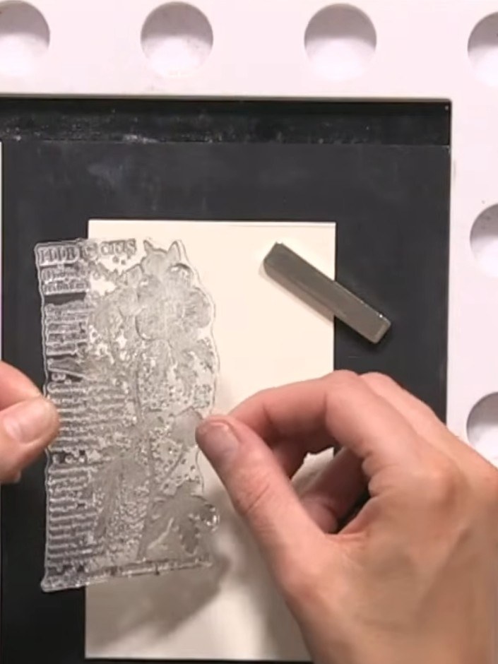Step 12: Stamp the hibiscus design on the left side of the interior card piece, positioning it off the edge so it appea