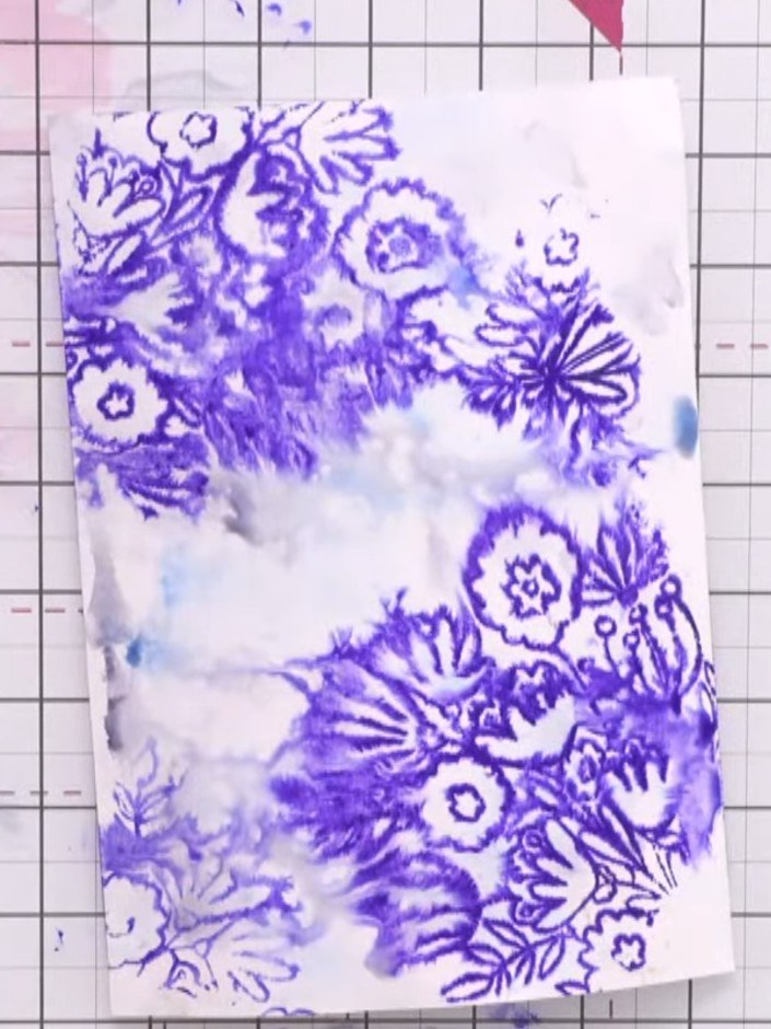 Passo 8: Cut out the stamped foliage pieces from the watercolour background, leaving some stems attached to create dime