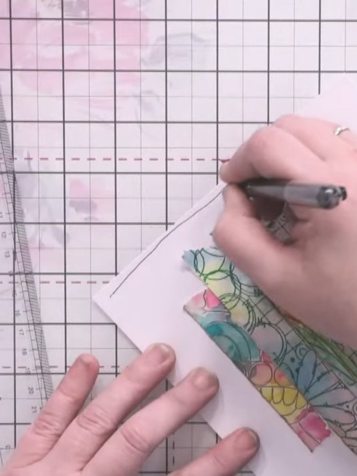 Passo 2: Use a black pen to draw decorative details around the die-cut word, such as small circles, connecting lines, a