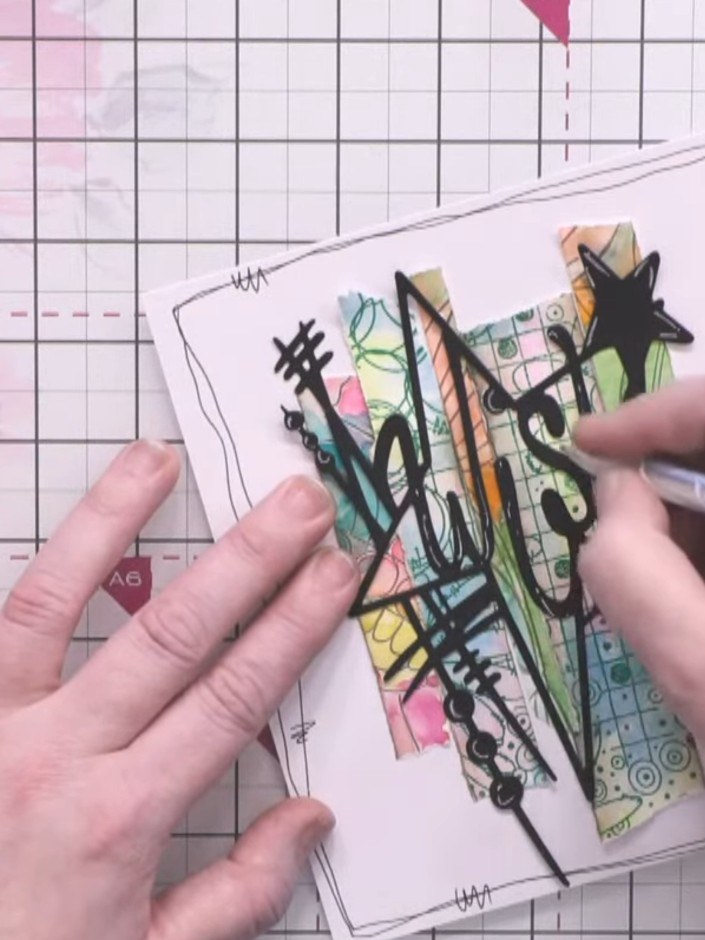 Passo 6: Add final details to your card using a black pen to draw additional decorative elements around the 'Wish' die-