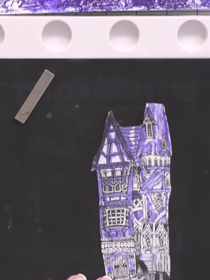 Paso 10: Add darker purple ink tones along the edges of the stamped house image to create shadow and depth, building up