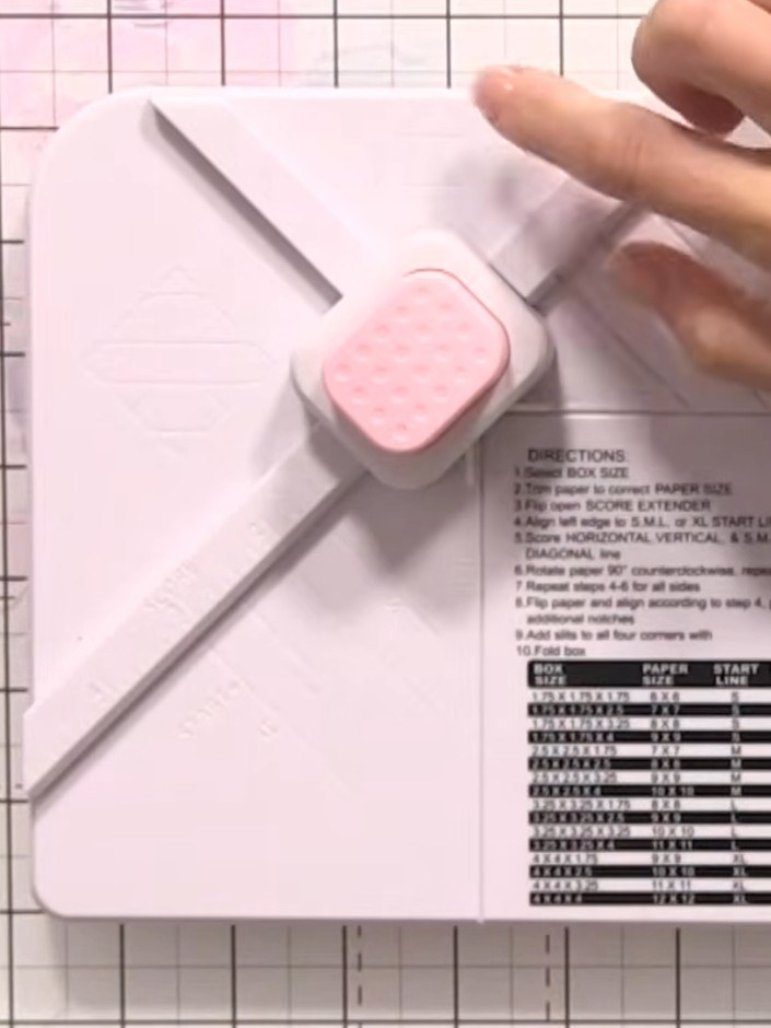Step 1: Cut your card stock to 10½ by 10½ inches using the box and envelope maker board as a guide.