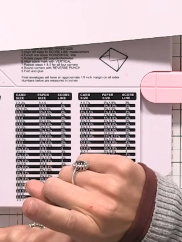 Step 2: Place the card into the box board at the 4½ inch mark. Twist the board 90 degrees and score once across the pa