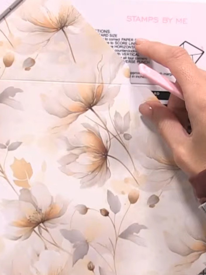Step 5: Rotate the paper once more. Use the box and envelope maker to punch and score the final line to complete the s