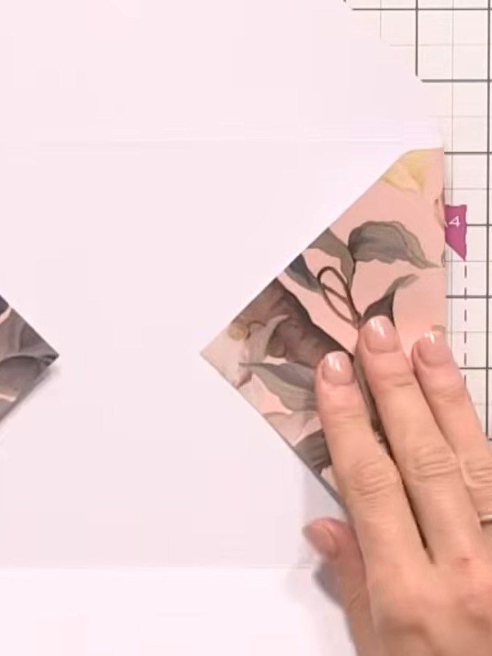 Step 7: Use the corner punch tool to round off the corners of the envelope flap for a professional finish.