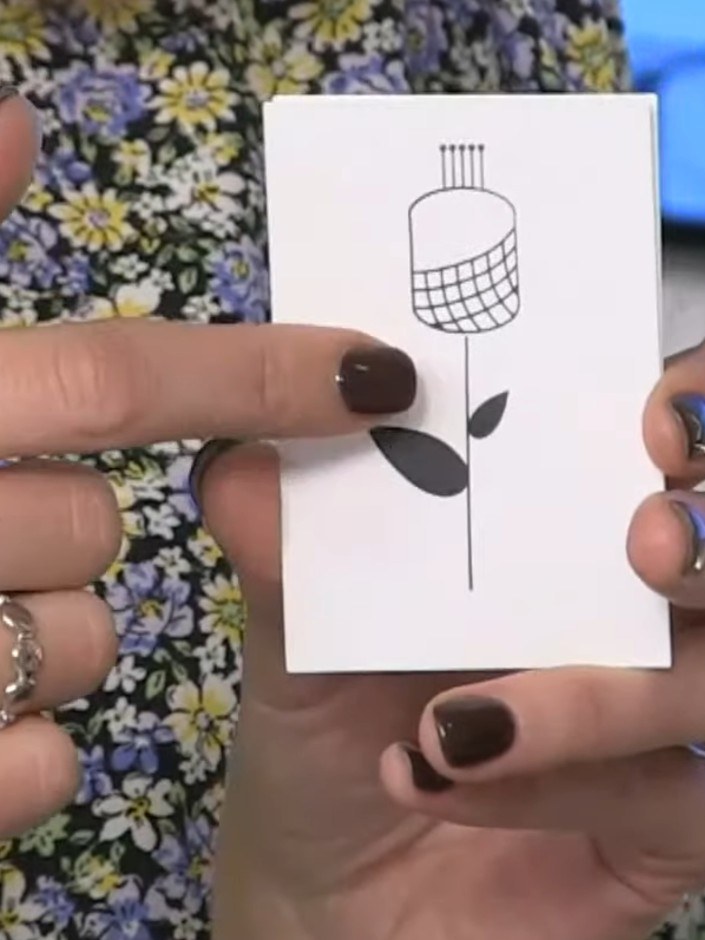 Stap 1: Stamp the solid floral element from the mid-century modern florals stamp set onto white cardstock. Use Distres