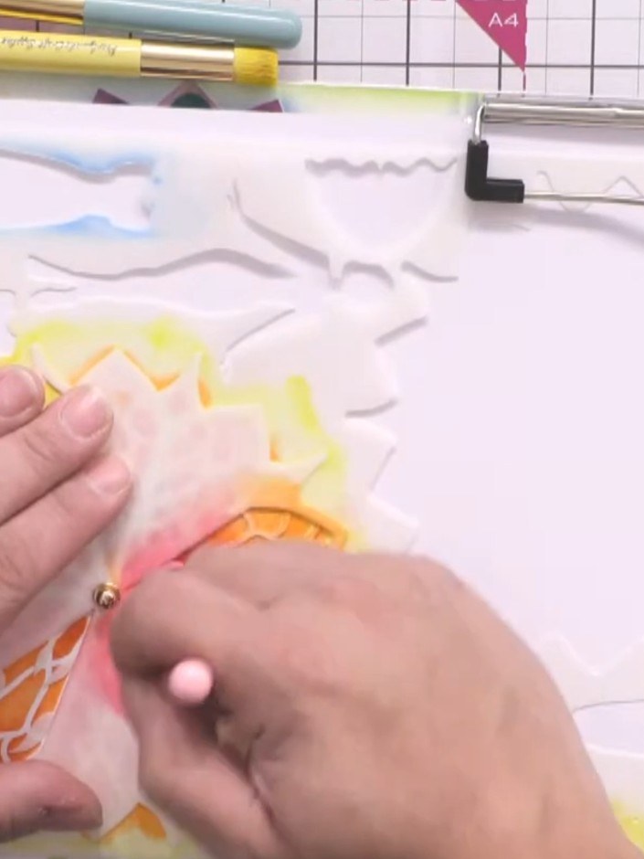 Stap 8: Add a sentiment stamp or embellishment to the centre of your mandala if desired. This completes your layered i