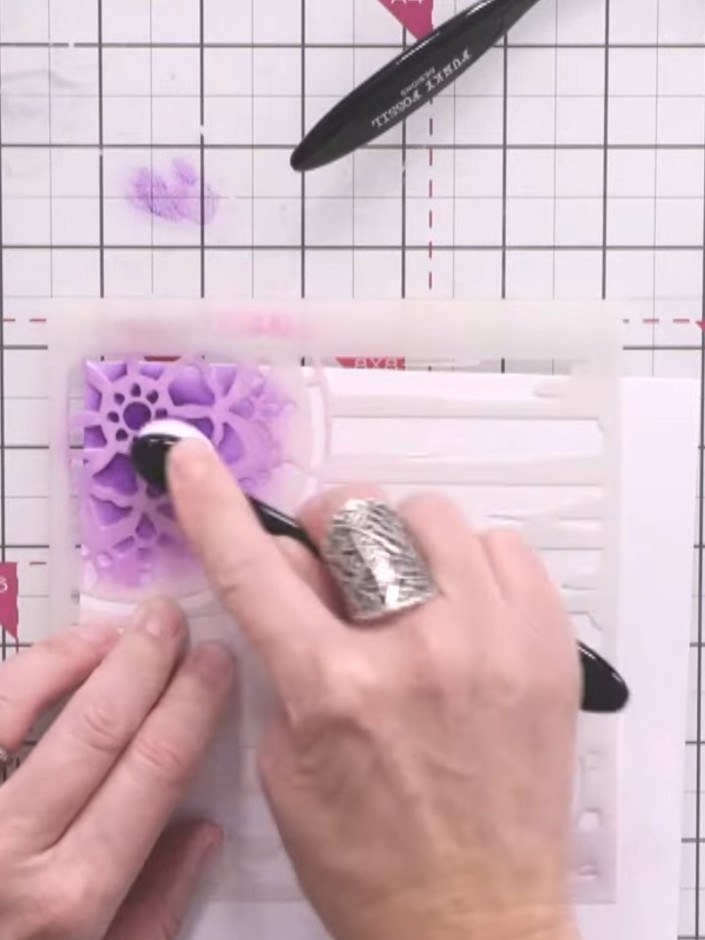 Passo 3: Using a blending brush, apply blush and bittersweet inks through the stencil. Work gently in circular motions 