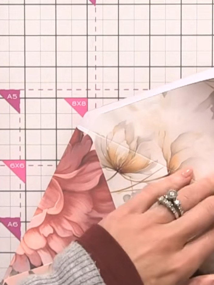 Step 7: Tuck the tail of the envelope inward and smooth it down. Apply adhesive to secure the tail in place for a neat