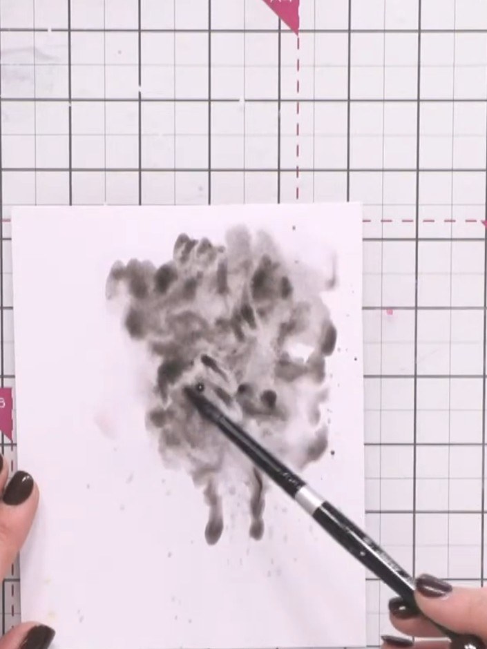 Passo 4: Allow the black watercolour paint to dry naturally on the white card. Do not use a heat tool as this may cause