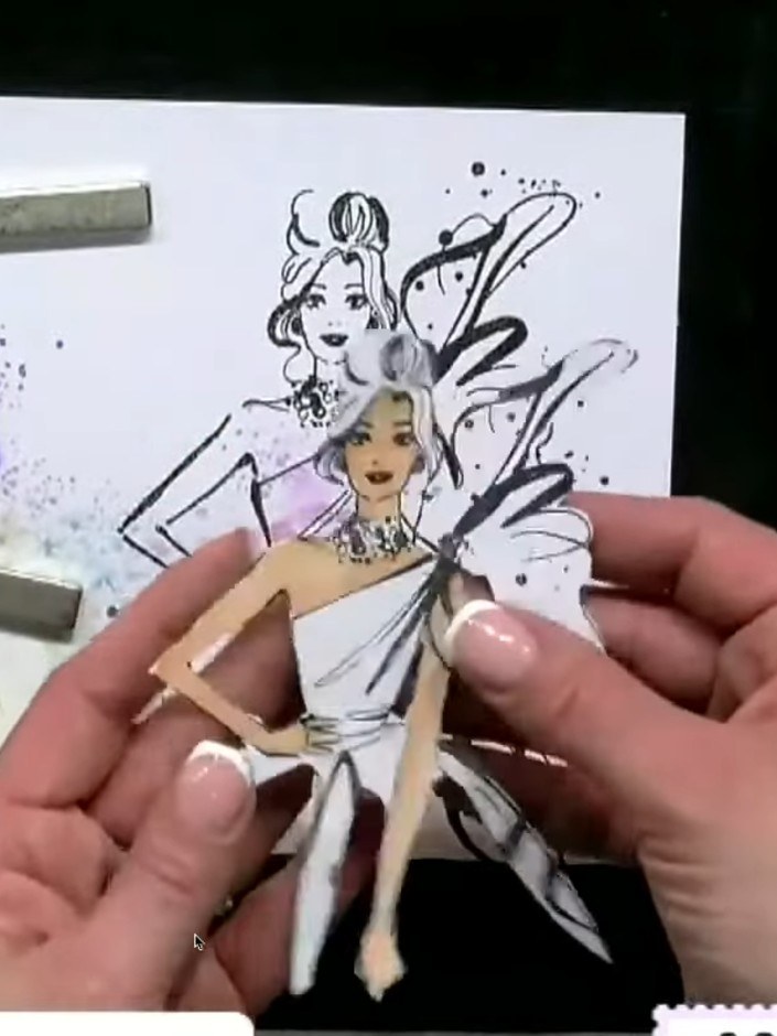 Passo 3: Use Versafine ink to stamp the Make It Happen fairy image clearly onto your prepared watercolour background. P