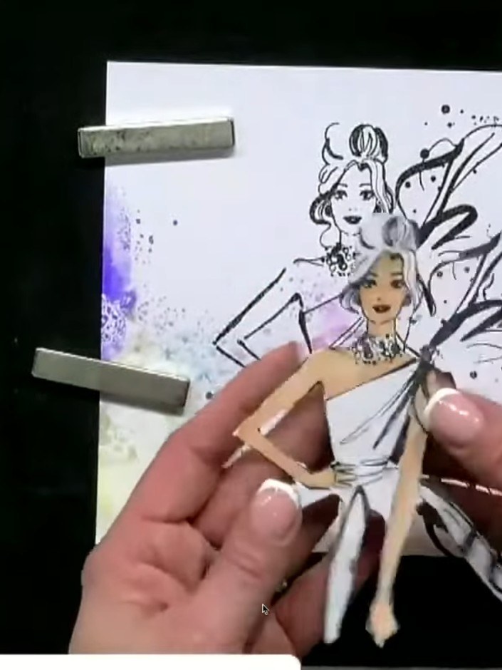Passo 4: Apply a light wash of watercolour to the stamped image using moist watercolours. Layer the colours gradually t
