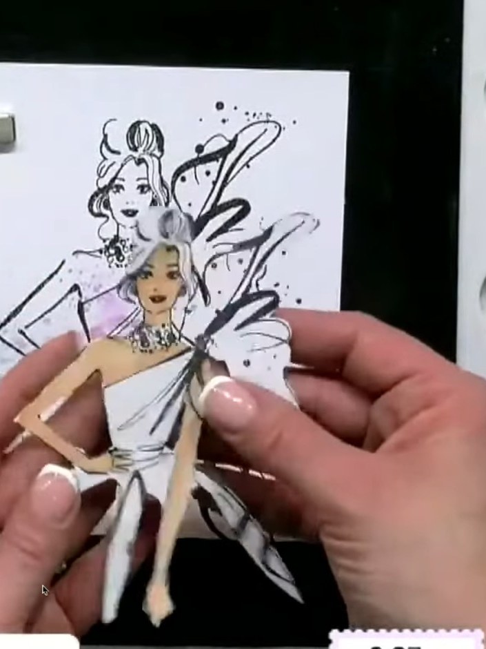 Passo 6: Continue building up the watercolour on the fairy figure, adding layers to develop skin tones and details. Wor