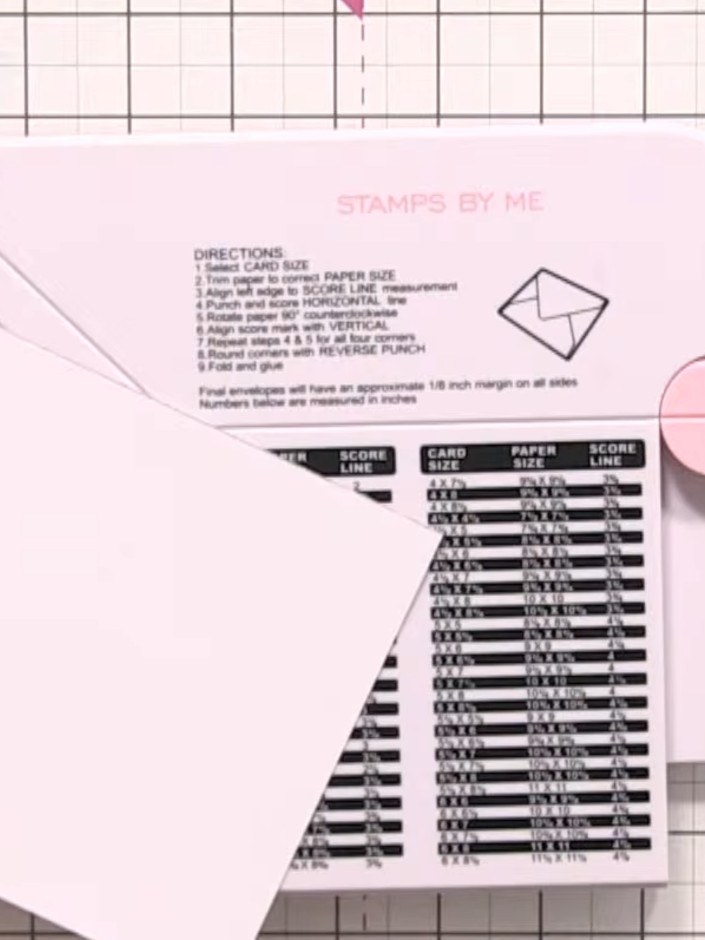 Step 4: Rotate the card and align it with the corner guide on the box and envelope maker. Punch and score the card alo