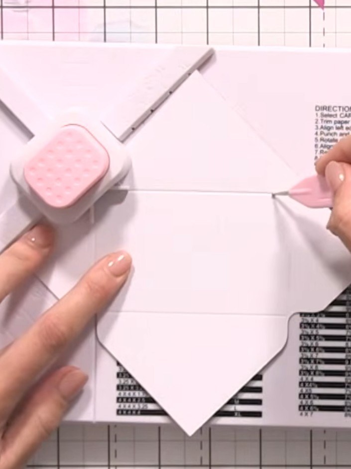 Step 7: Fold the envelope together along the scored lines. Apply glue to the side flaps and press them down to secure 