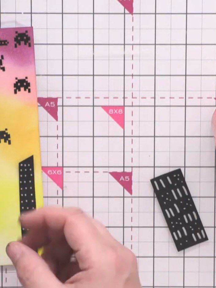 Passo 11: Add foam pads to the smaller building strips and layer them in front of the larger buildings to create depth, 